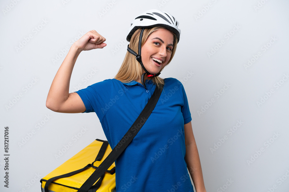 Young caucasian woman with thermal backpack isolated on white background doing strong gesture Young caucasian woman with thermal backpack isolated on white background doing strong gesture