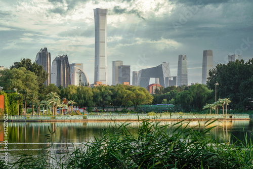 Cloudy sky and dark clouds in Beijing International Trade CBD building complex © 文普 王