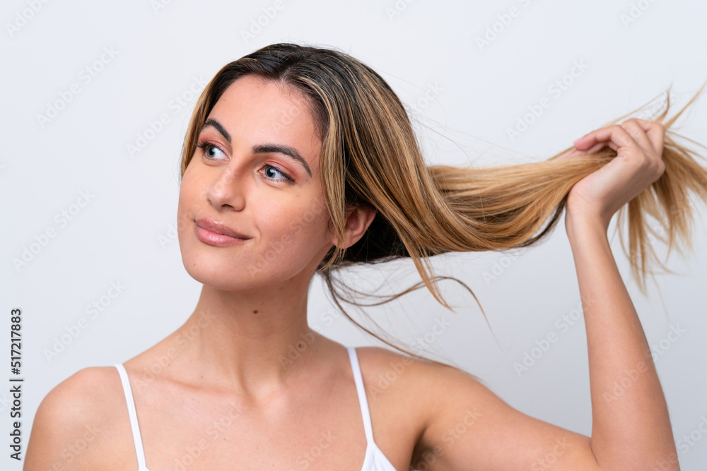 Young caucasian woman isolated on white background with happy expression. Close up portrait Young caucasian woman isolated on white background with happy expression. Close up portrait