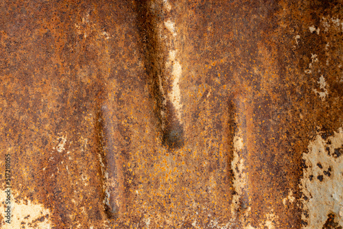 Rust on a metallic red texture