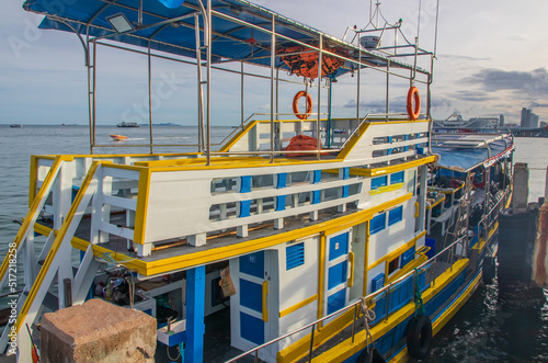 View of the stern and the back deck of an excursion or event boat for diving tours at a pier in Thailand © Willi