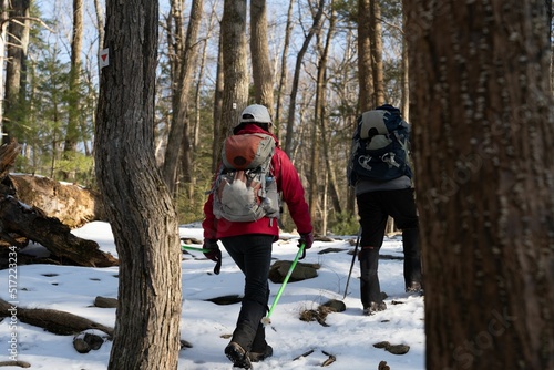 Hikers in Harriman State Park during the day in winter photo