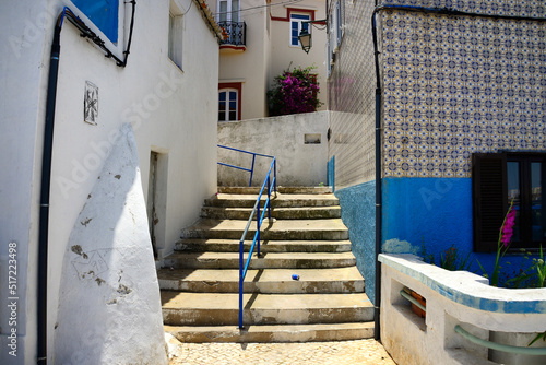 narrow streets and characteristic Algarvian architecture, Old Town of Ferragudo, Lagoa, Algarve, Portugal, Europe photo