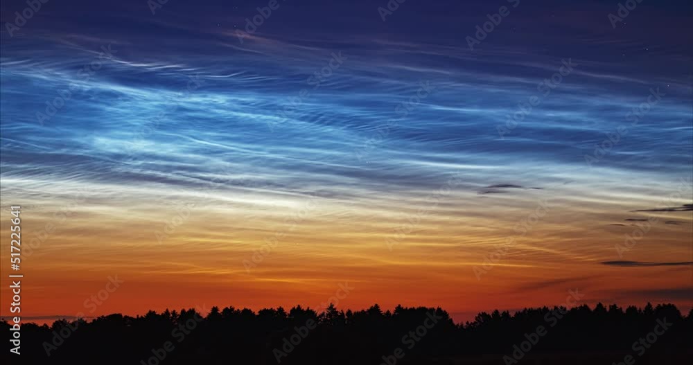 Noctilucent clouds in the night sky, extremely high altitude clouds that appear around the north regions Noctilucent clouds in the night sky, extremely high altitude clouds that appear around the north regions