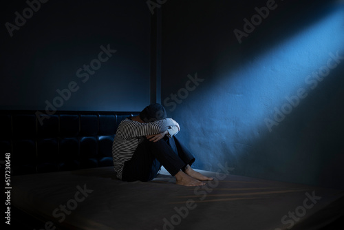 sad man in the dark room