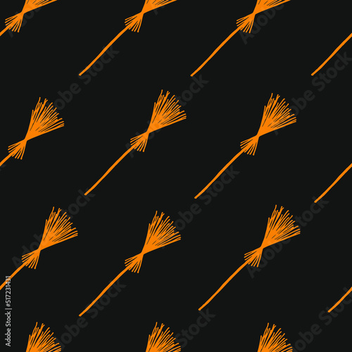 Seamless pattern from rustic brooms. Background from handmade brooms. Halloween concept.