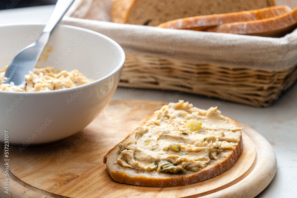 cracklings spread with pickled cucumber on slice of bread cracklings spread with pickled cucumber on slice of bread