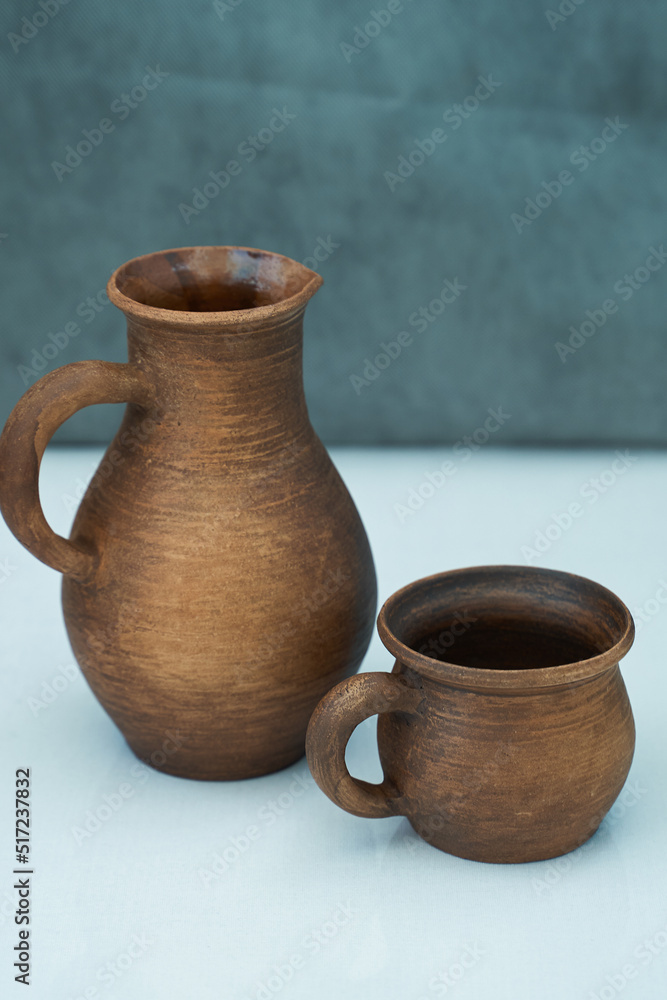 Ceramics, a ceramic product made with your own hands, made on a potter's wheel, a jug, a mug, clay. Ceramics, a ceramic product made with your own hands, made on a potter's wheel, a jug, a mug, clay.