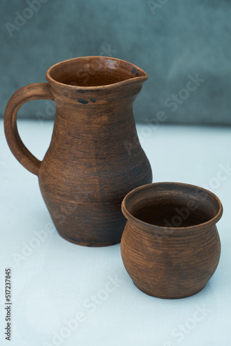      Ceramics, a ceramic product made with your own hands, made on a potter's wheel, a jug, a mug, clay.  © nikolay_alekhin