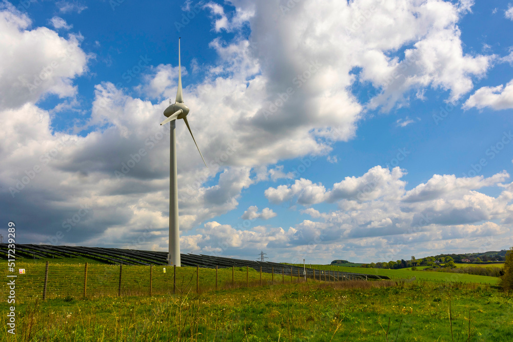 Single Wind Turbine On farmland concept of clean energy production