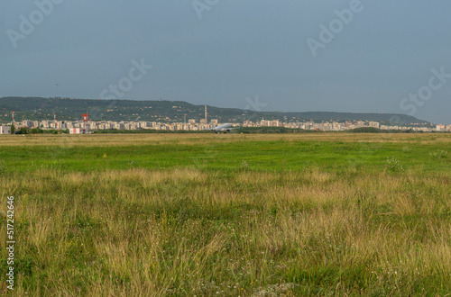 Wallpaper Mural Arriving plane at the airport in the middle of the tourist season. Torontodigital.ca