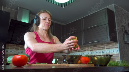 girl cutting salad in the kitchen