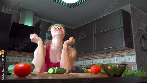 girl cutting salad in the kitchen