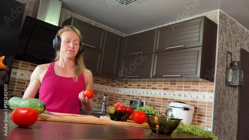 girl cutting salad in the kitchen