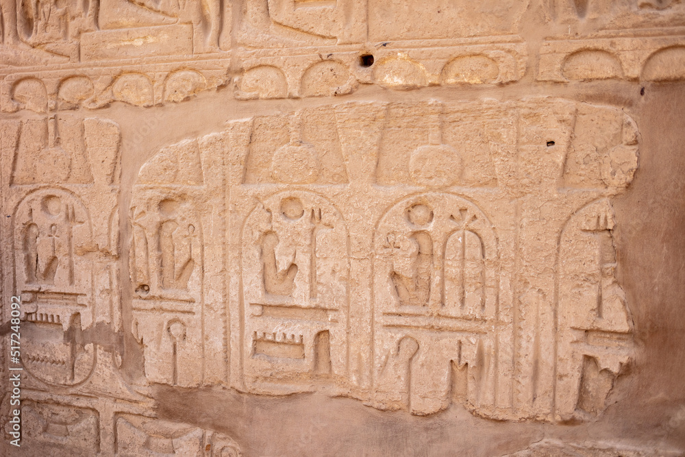 Different hieroglyphs on the walls and columns in the Karnak temple. Karnak temple is the largest complex in ancient Egypt. Different hieroglyphs on the walls and columns in the Karnak temple. Karnak temple is the largest complex in ancient Egypt.