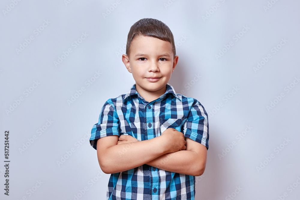 Handsome, smiling boy with crossed arms. Handsome, smiling boy with crossed arms.