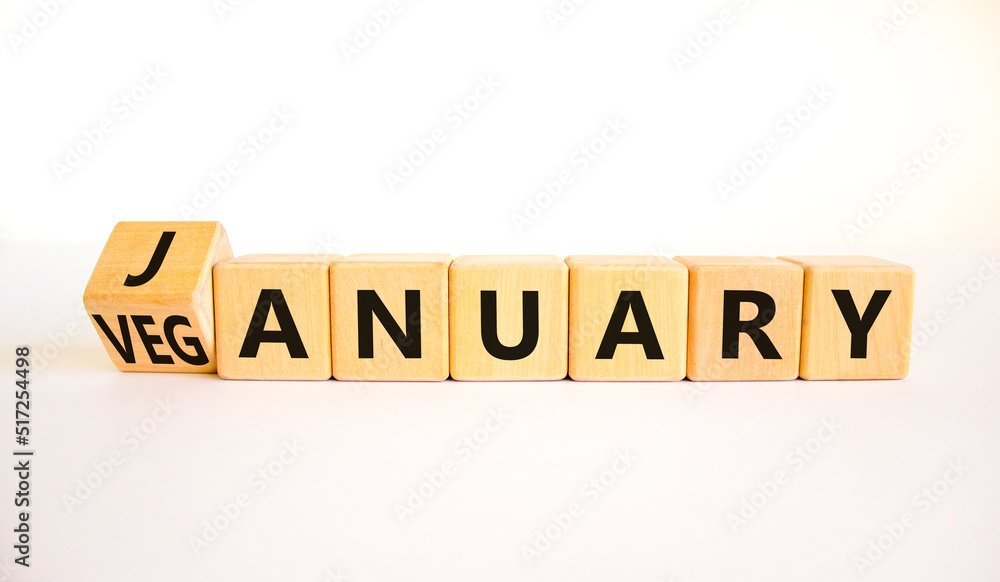 Veganuary in january symbol. Turned wooden cubes and changed the concept word January to Veganuary. Beautiful white background copy space. Medical and healthy veganuary in january concept. Veganuary in january symbol. Turned wooden cubes and changed the concept word January to Veganuary. Beautiful white background copy space. Medical and healthy veganuary in january concept.