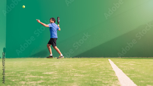 Monitor practicing paddle sport on the outdoor court. Man teaching padel class © REC Stock Footage