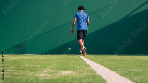A caucasian padel player jump to the ball, good looking for posts and poster. © REC Stock Footage