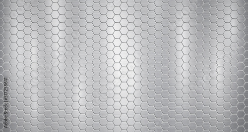 Abstract metallic background in gray colors with highlights, consisting of small voluminous convex hexagonal plates