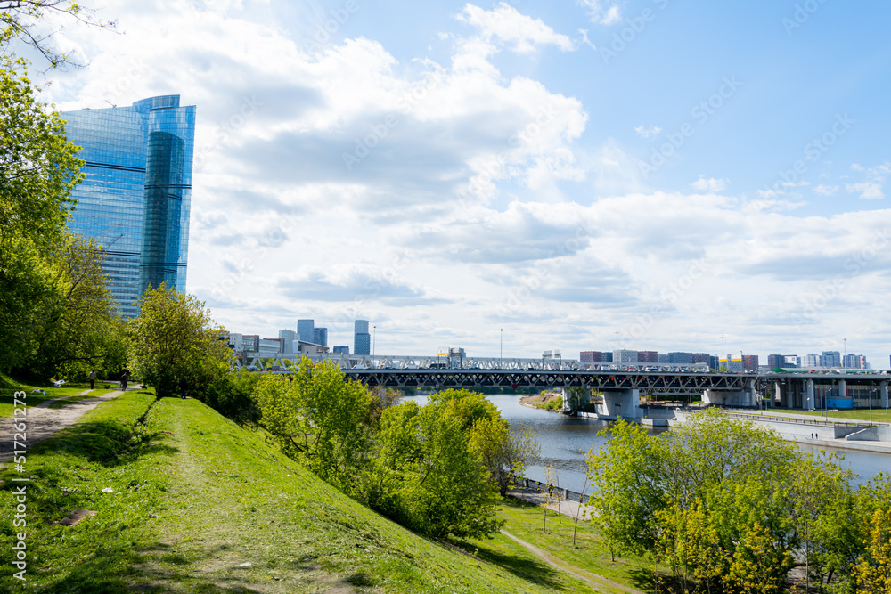 Fototapeta premium Moscow-City and Moscow-river area, Russia. modern architecture. Moscow City and skyscraper Moscow International Business Center in daytime against the blue sky with place for text
