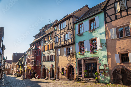 Traditional old alsatian houses in Riquewihr in Alsace in the department of Haut-Rhin of the Grand Est region of France