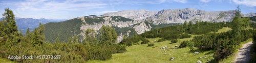 Panoramic view of the tourist path in Totes Gebirge (Alps) with a background of a ridge of Torstein and Pyhrner Kampl peaks, Austria