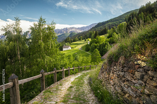 Switzerland nature and travel. Alpine scenery. Scenic traditional mountain village. Popular tourist destination.