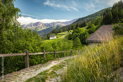 Switzerland nature and travel. Alpine scenery. Scenic traditional mountain village. Popular tourist destination.