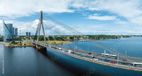 A panoramic image of the Vansu bridge that spans the river Daugava in the Latvian capital of Riga. photo