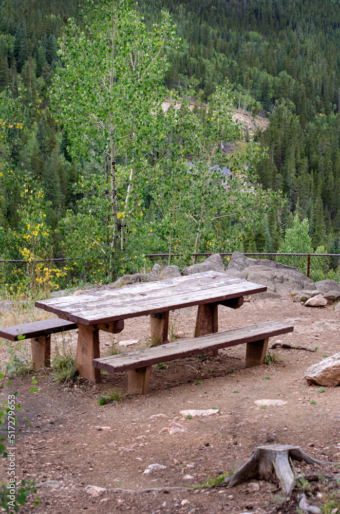 picnic table in the rockies at a beautiful overlook picnic table in the rockies at a beautiful overlook