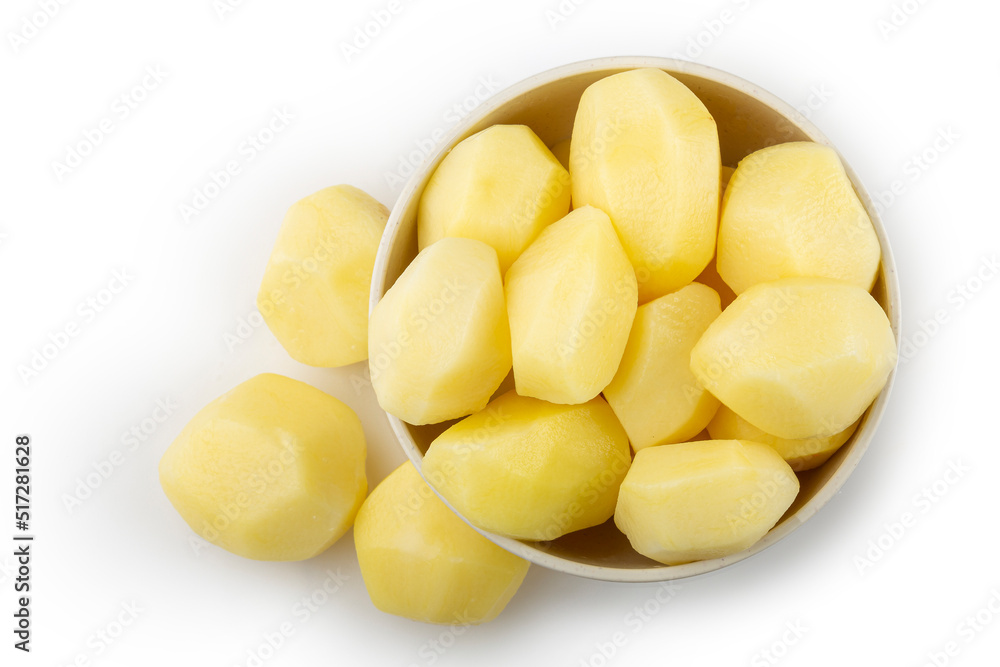 Peeled raw potatoes isolated on white background. Peeled raw potatoes isolated on white background.