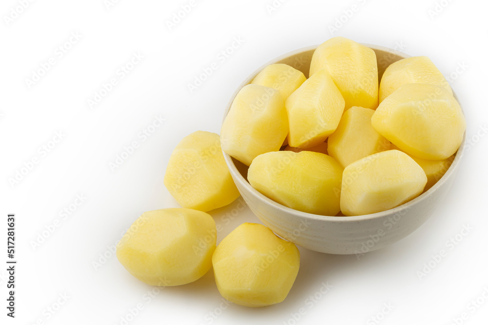 Peeled raw potatoes isolated on white background. Peeled raw potatoes isolated on white background.