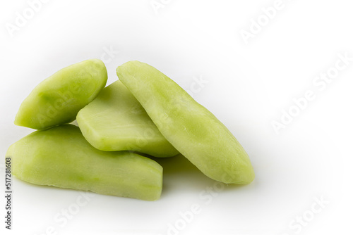 Peeled raw chayote isolated on white background.