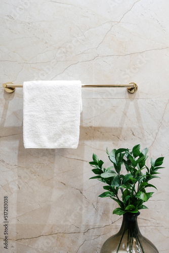 Cuadro en lienzo White bath towel hanging on rack in bathroom