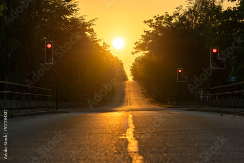 Fotografiet Empty road at sunrise