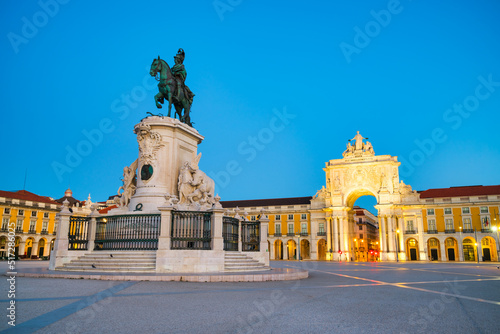 Commerce Square (Praca do Comercio) with Rua Augusta Arch and statue of of King Jose I at dawn in Lisbon. Portugal