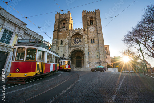 Lisbon city old town with famous Santa Maria cathedral at sunrise. Portugal