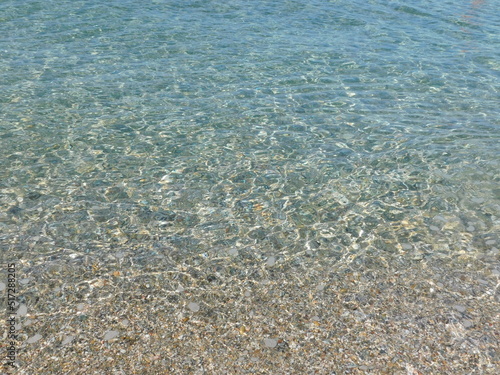 Tableau sur toile A beach with clear waters in Attica, Greece
