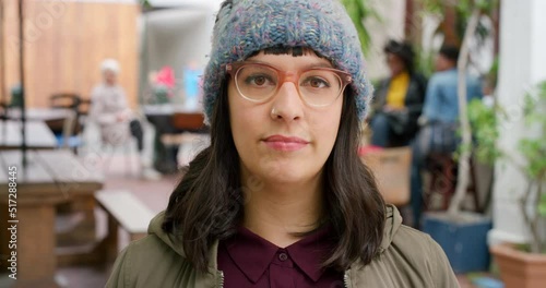 Wallpaper Mural Trendy and stylish young hipster woman wearing glasses outside at a cafe in an urban town. Portrait of a beautiful and confident female wearing the latest winter fashion while exploring the city Torontodigital.ca