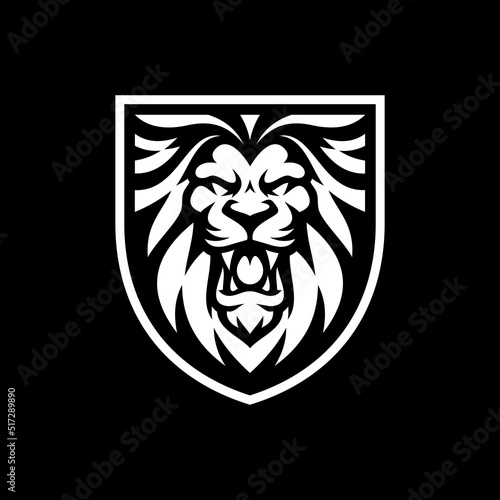 Lion head and shield mascot logo design. Lion emblem vector illustration on dark background