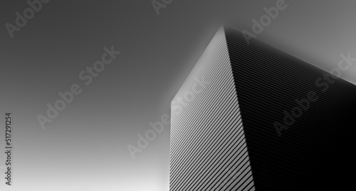 Black and white abstract high-rise building on a gray background with blur. Architectural abstract minimalism. High-rise building, black and white skyscraper on a gray background. 3D render.