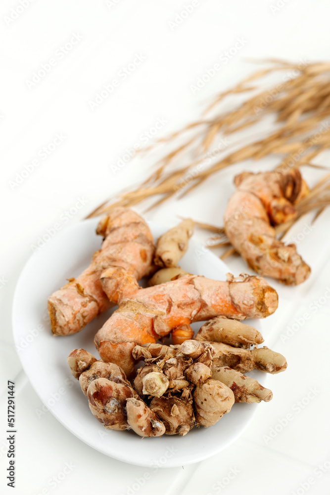 Rhizome Herbs Turmeric and Sand Ginger Kaempferia Galanga on White Table