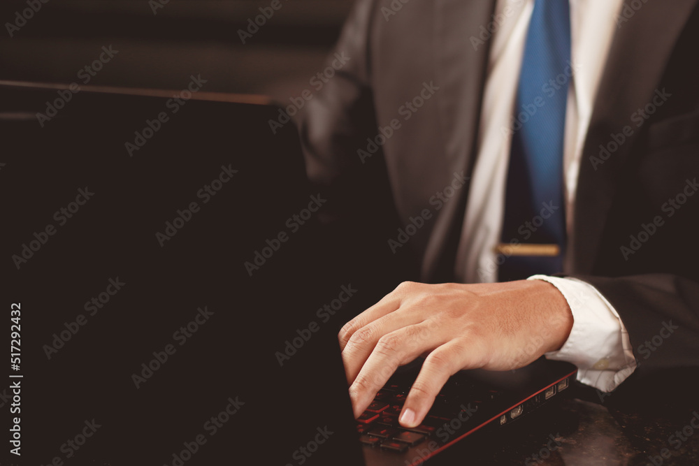 businesmen working on laptop, close up, warm look, Business concept