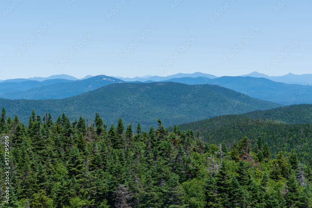Immerse yourself in the natural splendor of the Adirondack Mountains, where mountainous beauty and wilderness serenity create a breathtaking landscape in Upstate New York