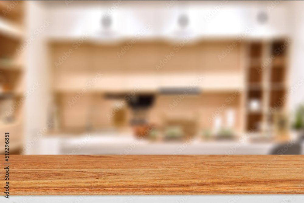 Wood table top on blur kitchen room background .For montage product display or design key visual layout Wood table top on blur kitchen room background .For montage product display or design key visual layout