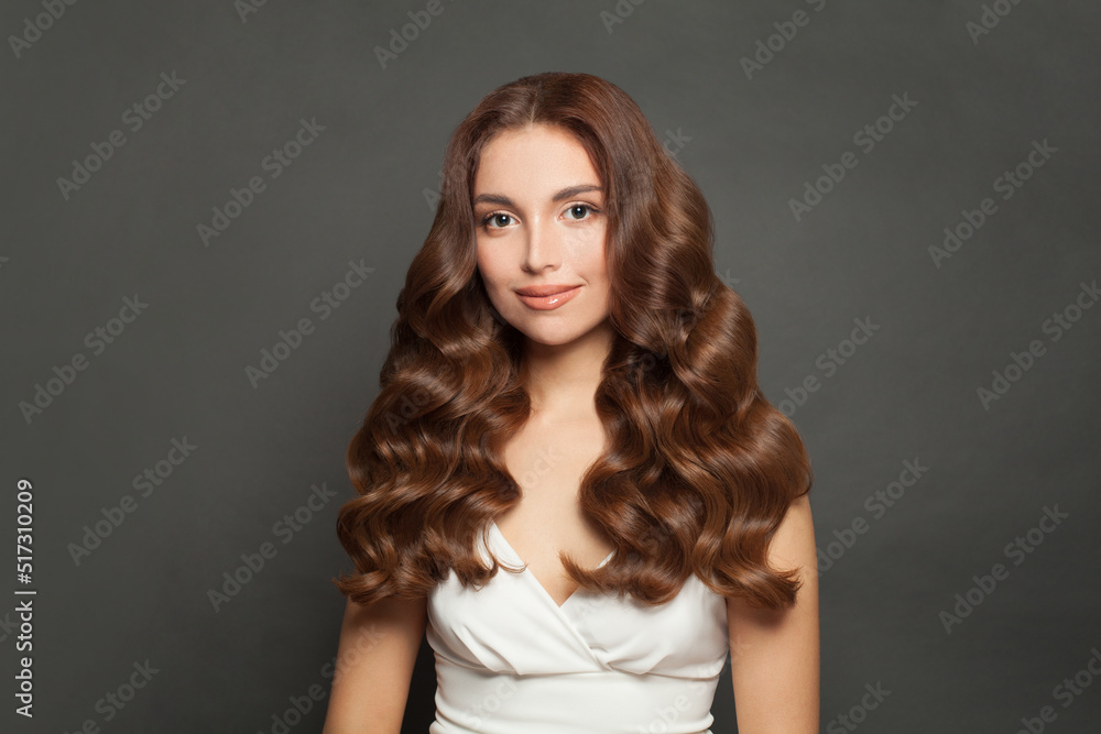 Beautiful woman with long curly hair Beautiful woman with long curly hair