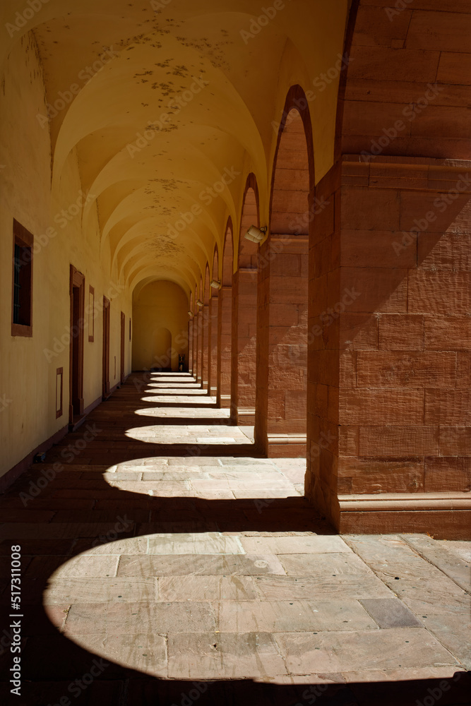 Old vault made of sandstone with round arches and interesting shade. Old vault made of sandstone with round arches and interesting shade.