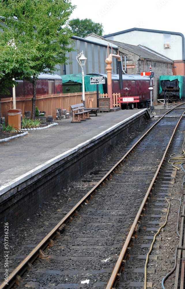 View along Deserted Rails and Platform at Old Heritage Railway Station 