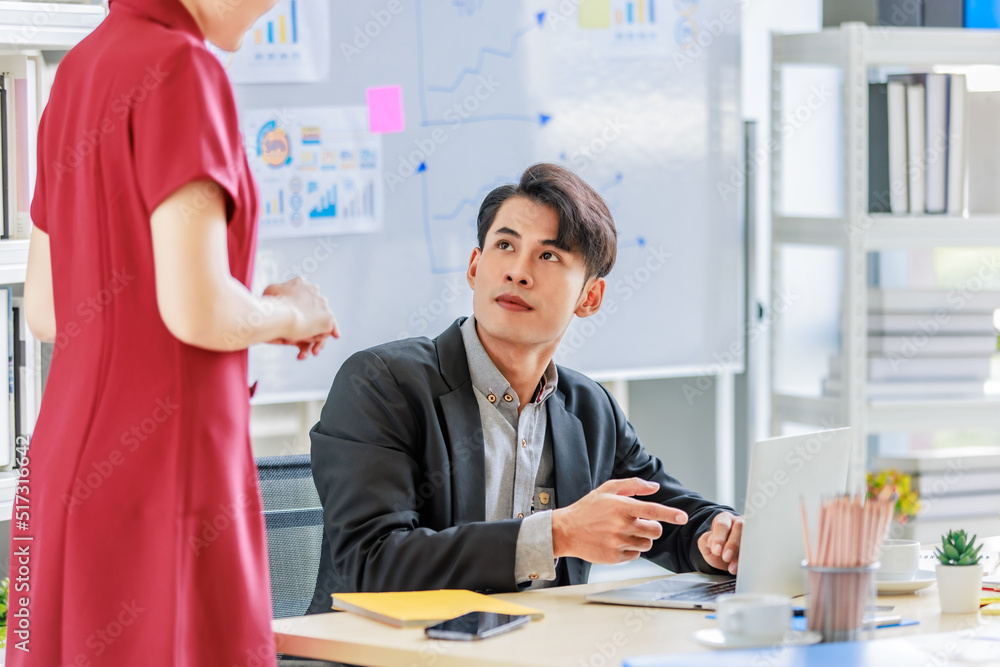 Group of millennial Asian Indian multinational multicultural male and female businessman businesswoman teamwork in formal suit sitting smiling brainstorming meeting together in office conference room. Group of millennial Asian Indian multinational multicultural male and female businessman businesswoman teamwork in formal suit sitting smiling brainstorming meeting together in office conference room.